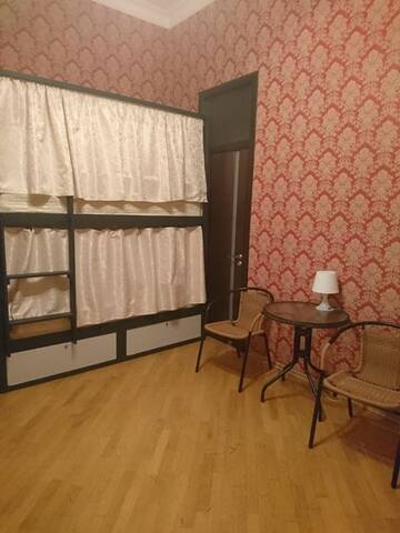 Спальное место в 6-местном женском номере в Гостинице Comfy Hostel